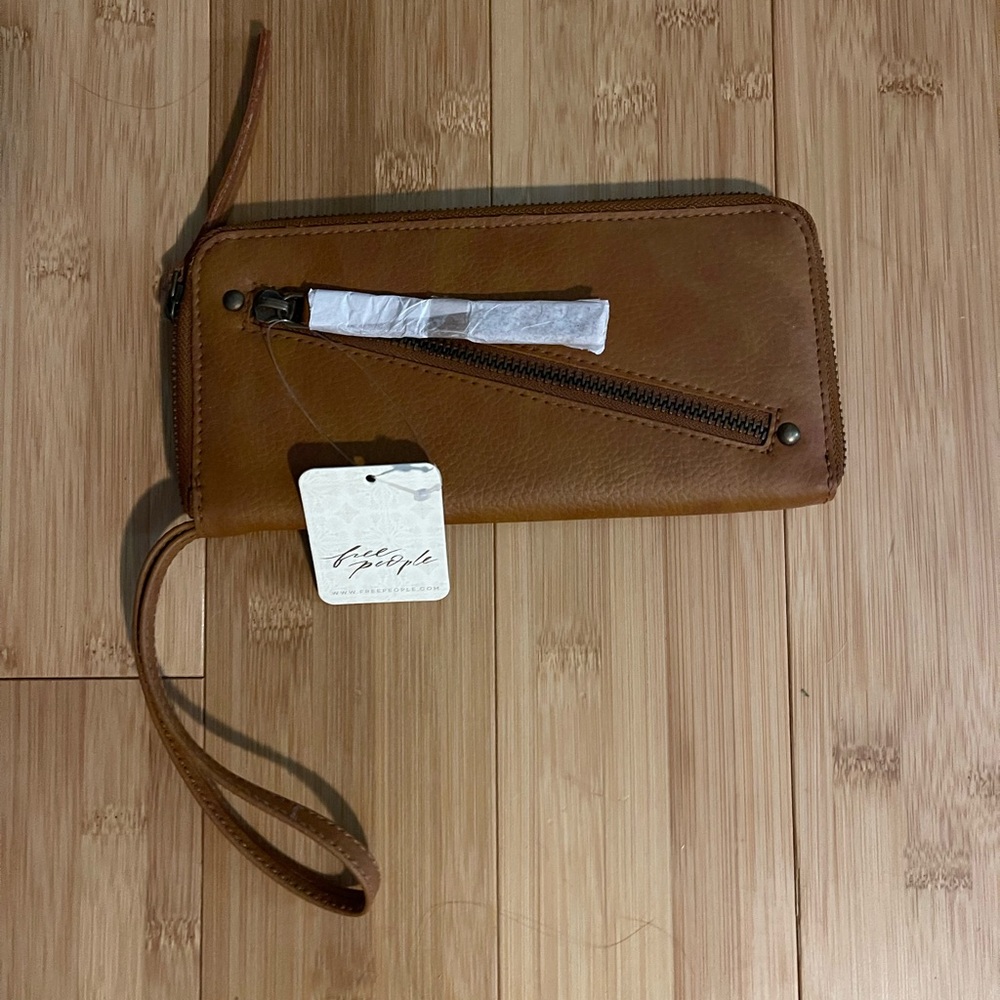 Free people brown  vegan wallet.